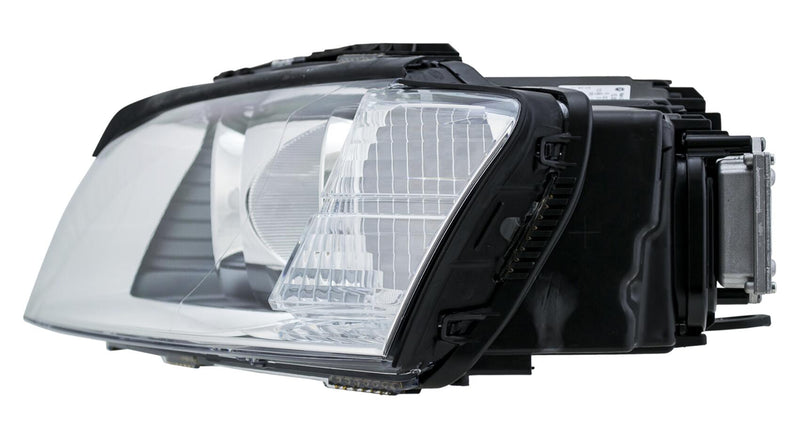 Audi Headlight Assembly – Driver Side (Xenon) (Adaptive) 4E0941029P – Hella 008540551