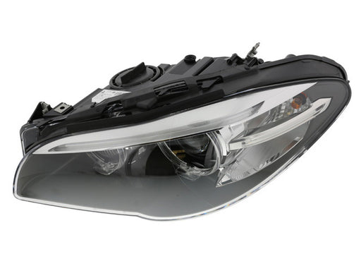 HELLA Headlight Assembly - 011087951