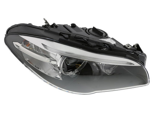 HELLA Headlight Assembly - 011087961