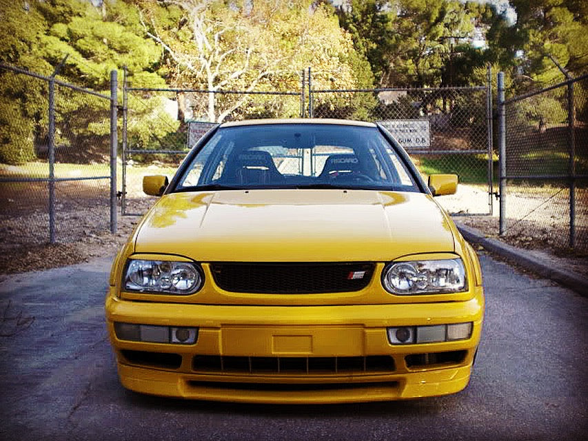 Yellow 1999 VW GTI VR6, front detail