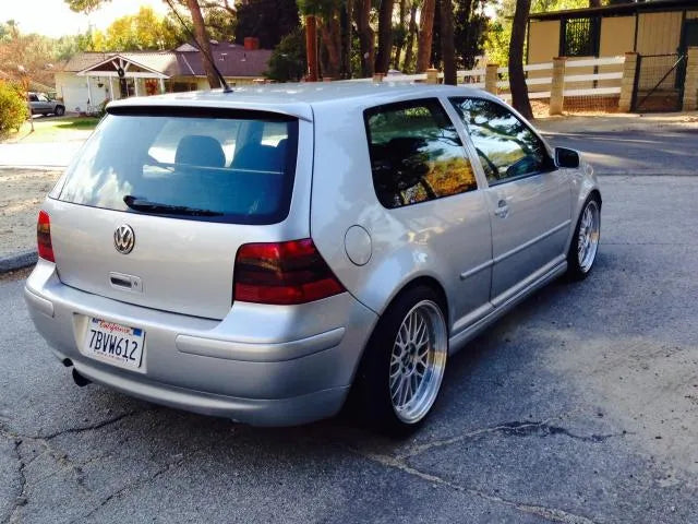 Silver 2002 VW GTI 337, passenger-side rear three-quarter view
